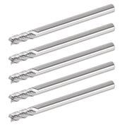 Five 4mm cermet flat end mills on white background